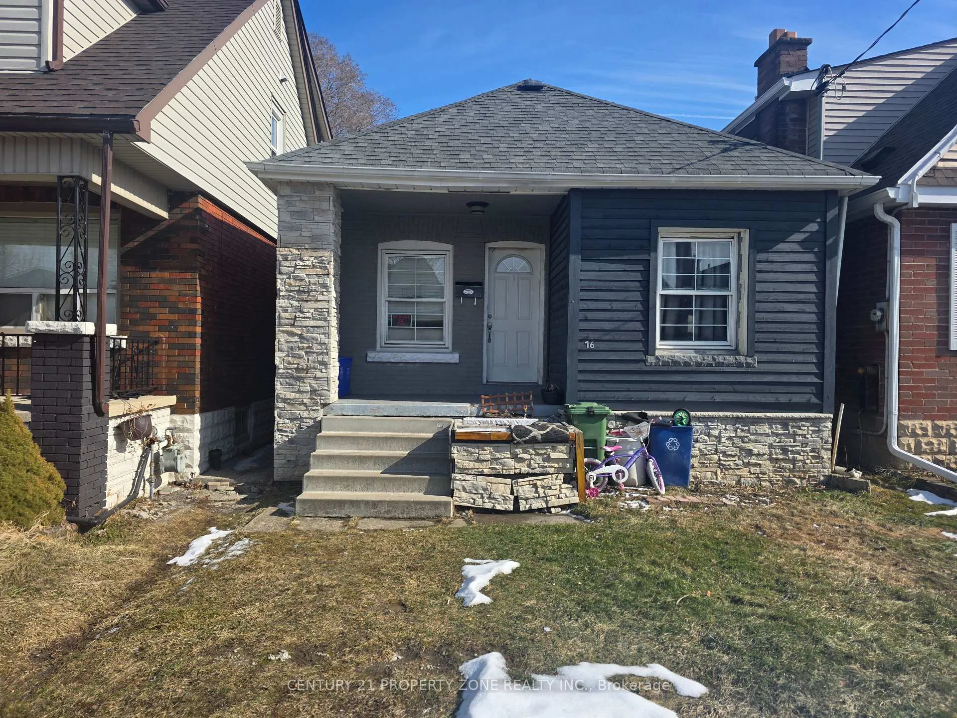 Front of 166 Barons Avenue N