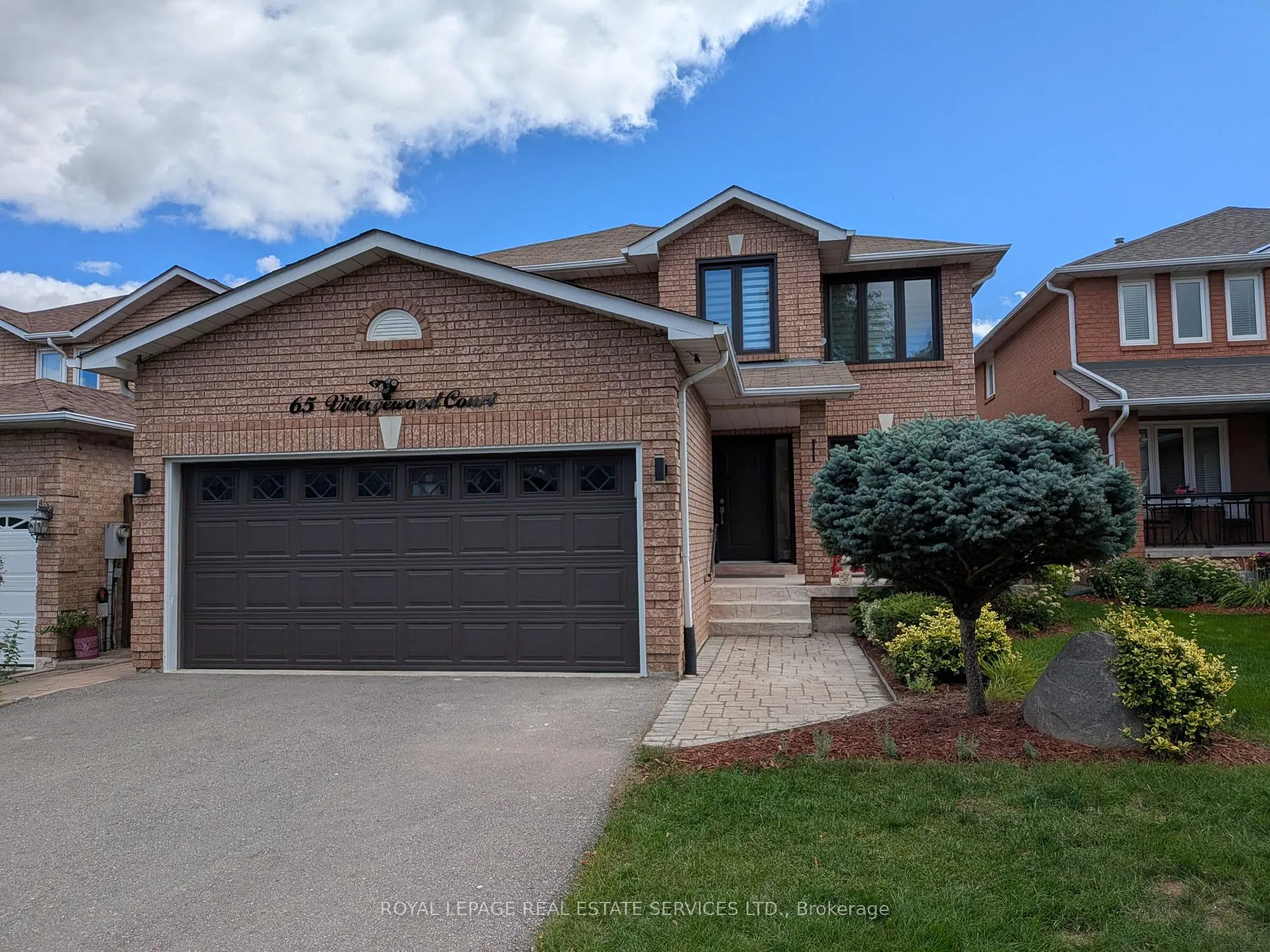 Front of 65 Villagewood Court