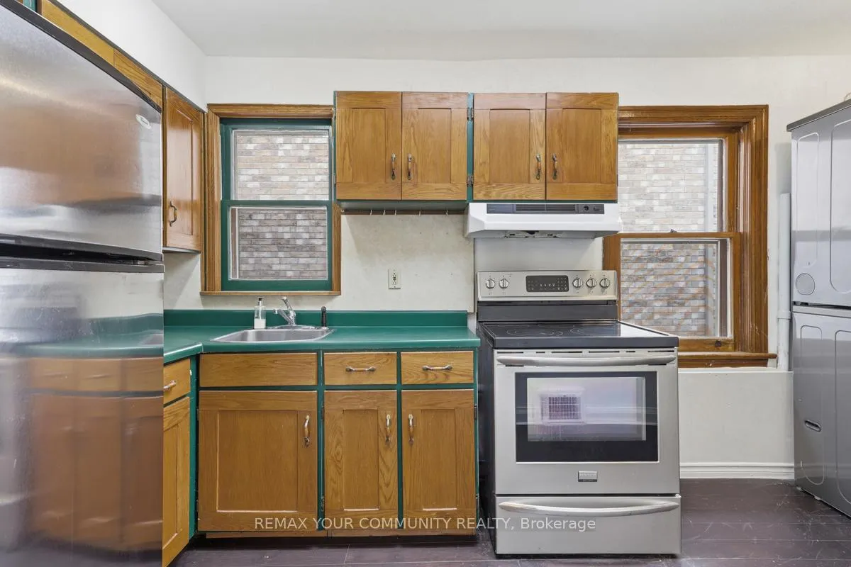 Photo 5 of Unit ENTIRE, 71 Lesmount Avenue, Toronto, Danforth Village-East York — HOMEH