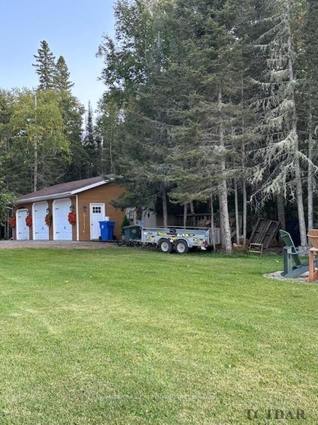 Photo 11 of 125 Highway 581, Kapuskasing — HOMEH