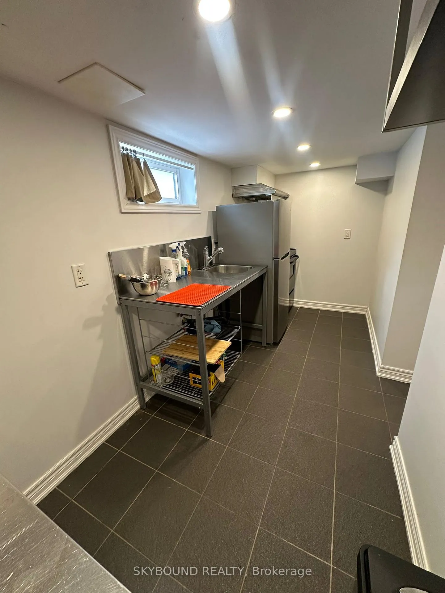 Photo 5 of Unit Lower, 19 Midburn Avenue, Toronto, Crescent Town — HOMEH