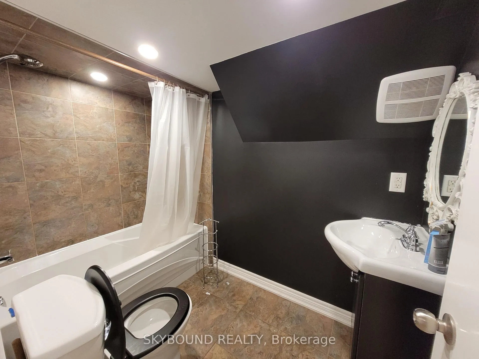 Photo 7 of Unit Lower, 19 Midburn Avenue, Toronto, Crescent Town — HOMEH