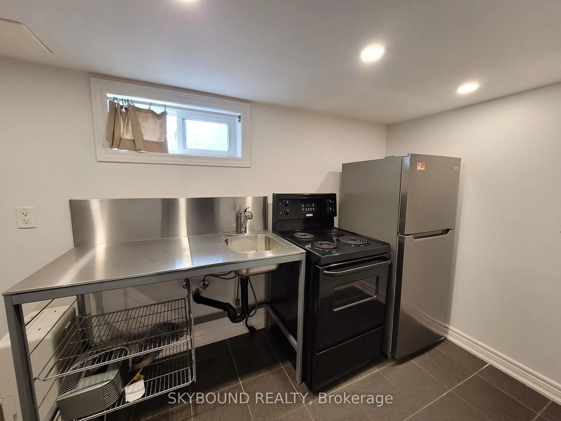 Photo 10 of Unit Lower, 19 Midburn Avenue, Toronto, Crescent Town — HOMEH