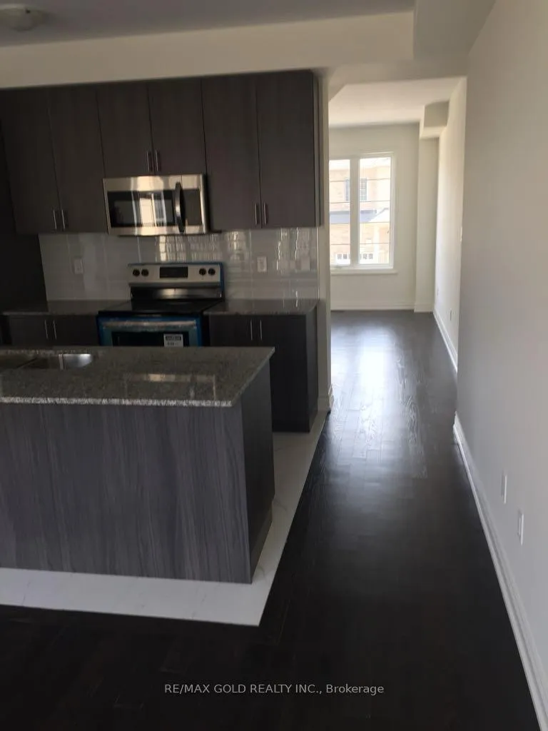 Photo 6 of 36 Brushwood Drive, Brampton, Bram West — HOMEH