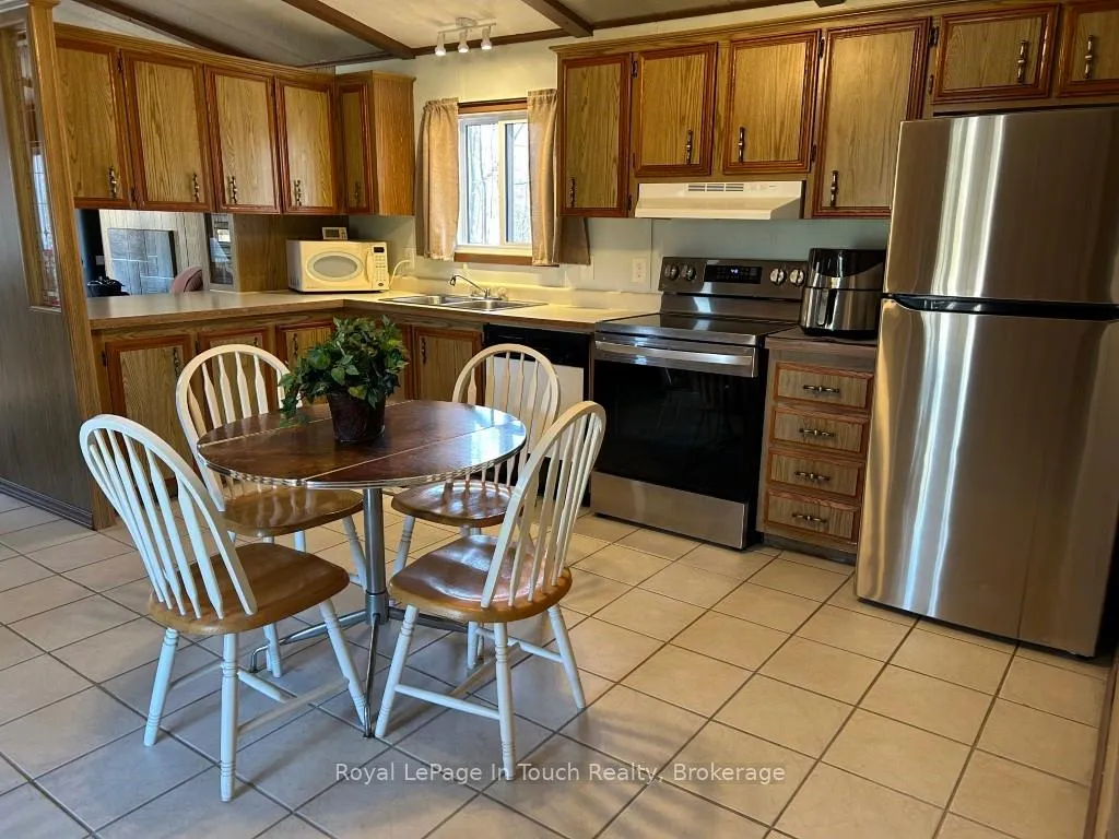 Photo 4 of Unit 37, 5263 Elliott Side Road, Tay, Rural Tay — HOMEH