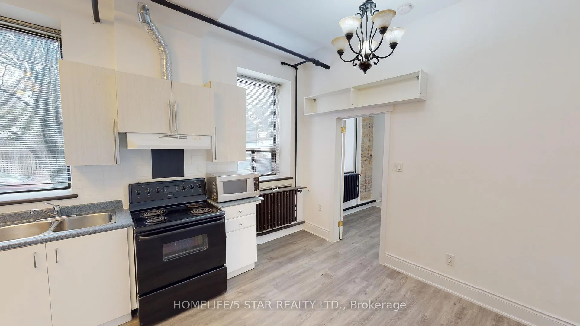 Photo 5 of Unit 201, 1152 Gerrard Street E, Toronto, South Riverdale — HOMEH