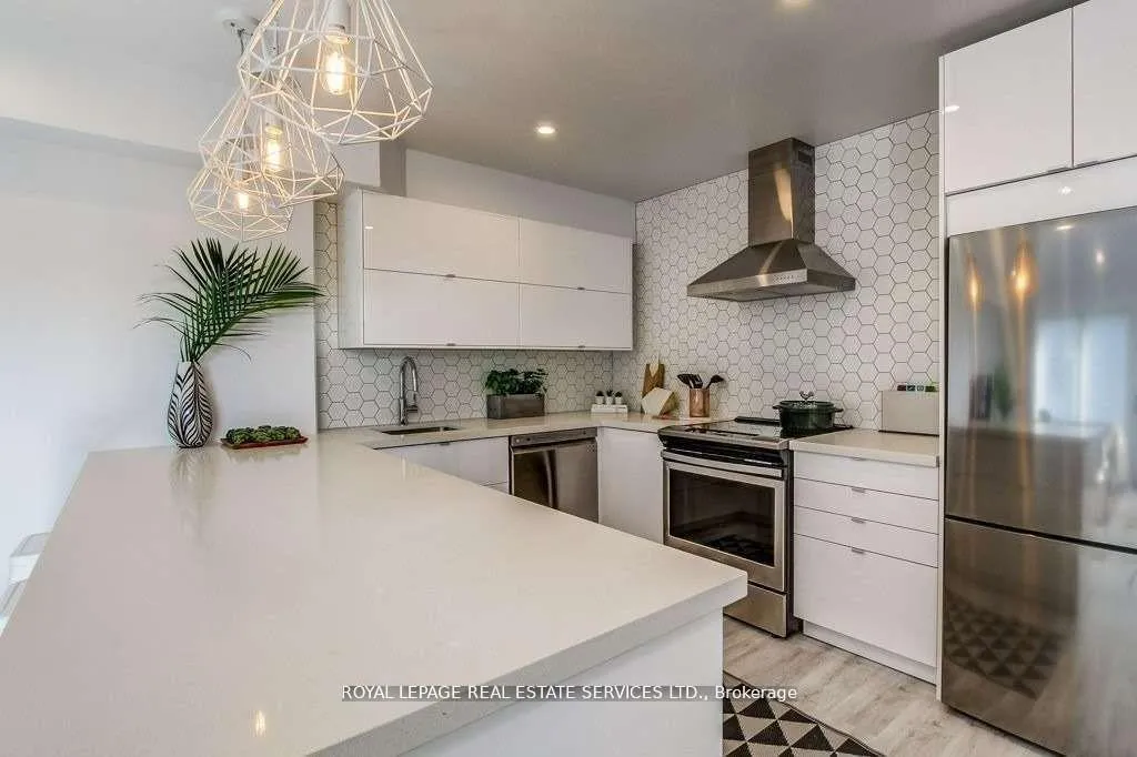 Photo 4 of Unit A, 6 Florence Crescent, Toronto, Rockcliffe-Smythe — HOMEH