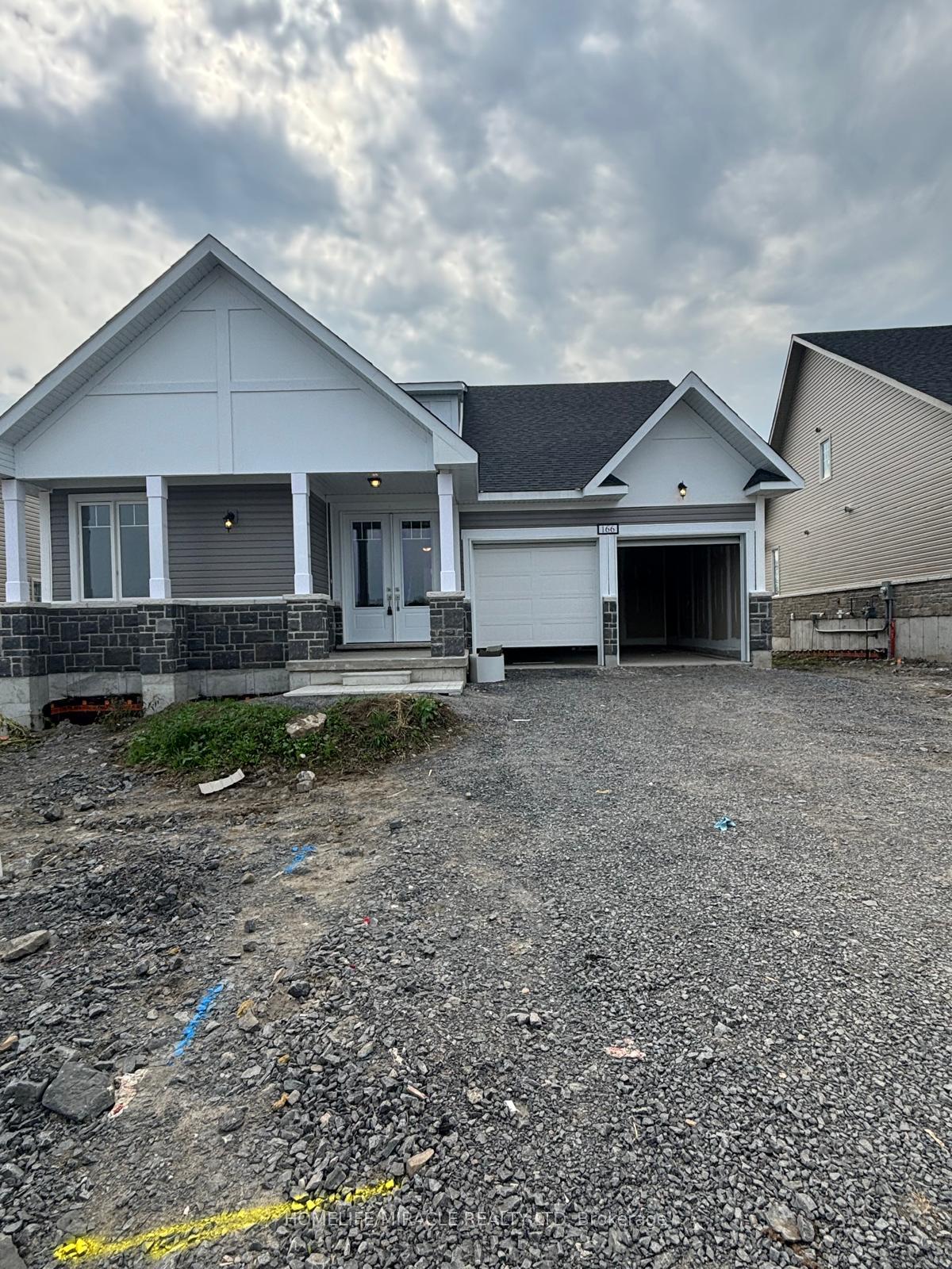 Front of 166 Country Club Drive