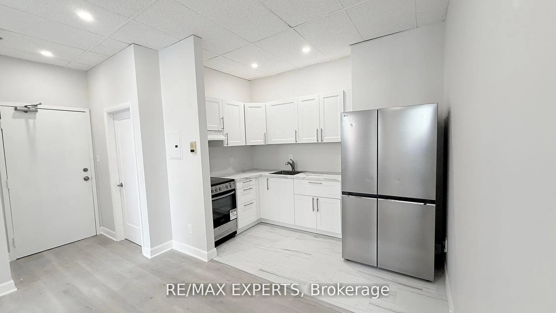 Photo 2 of Unit 404, 8 Main Street S, Brampton, Downtown Brampton — HOMEH