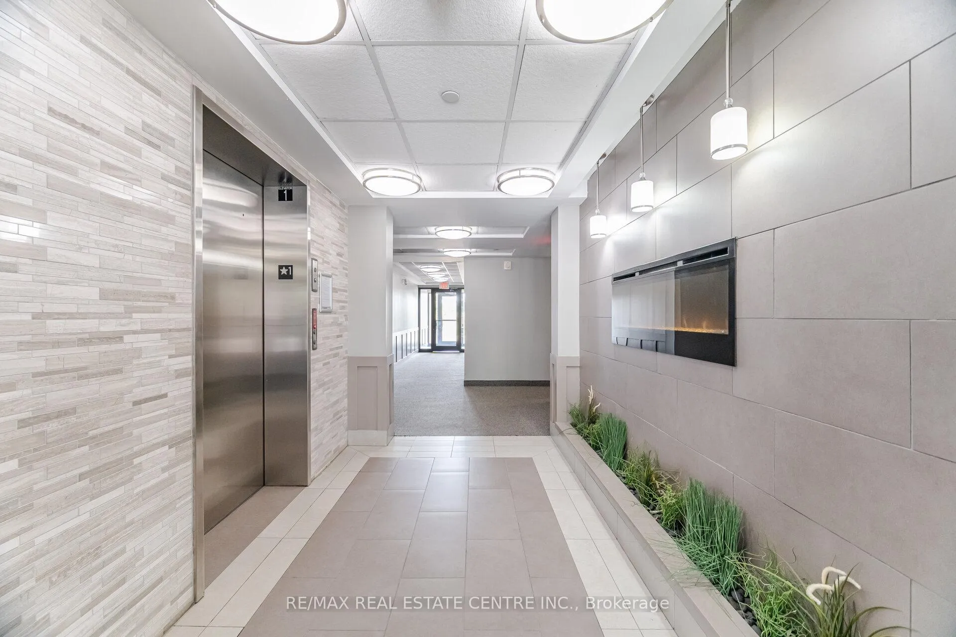 Photo 3 of Unit 203, 1005 Nadalin Heights, Milton, Willmott — HOMEH