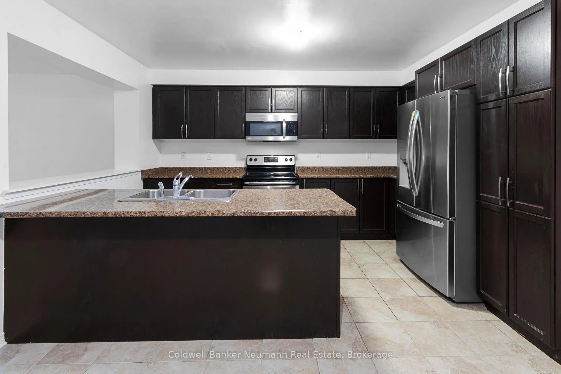 Photo 3 of Unit 107, 1035 Victoria Road S, Guelph, Kortright East — HOMEH