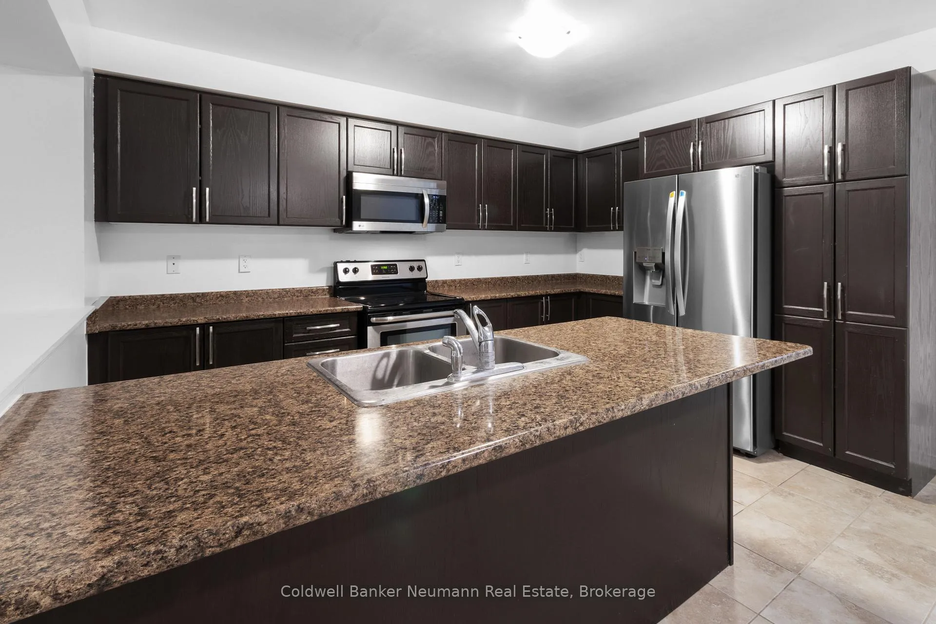 Photo 4 of Unit 107, 1035 Victoria Road S, Guelph, Kortright East — HOMEH