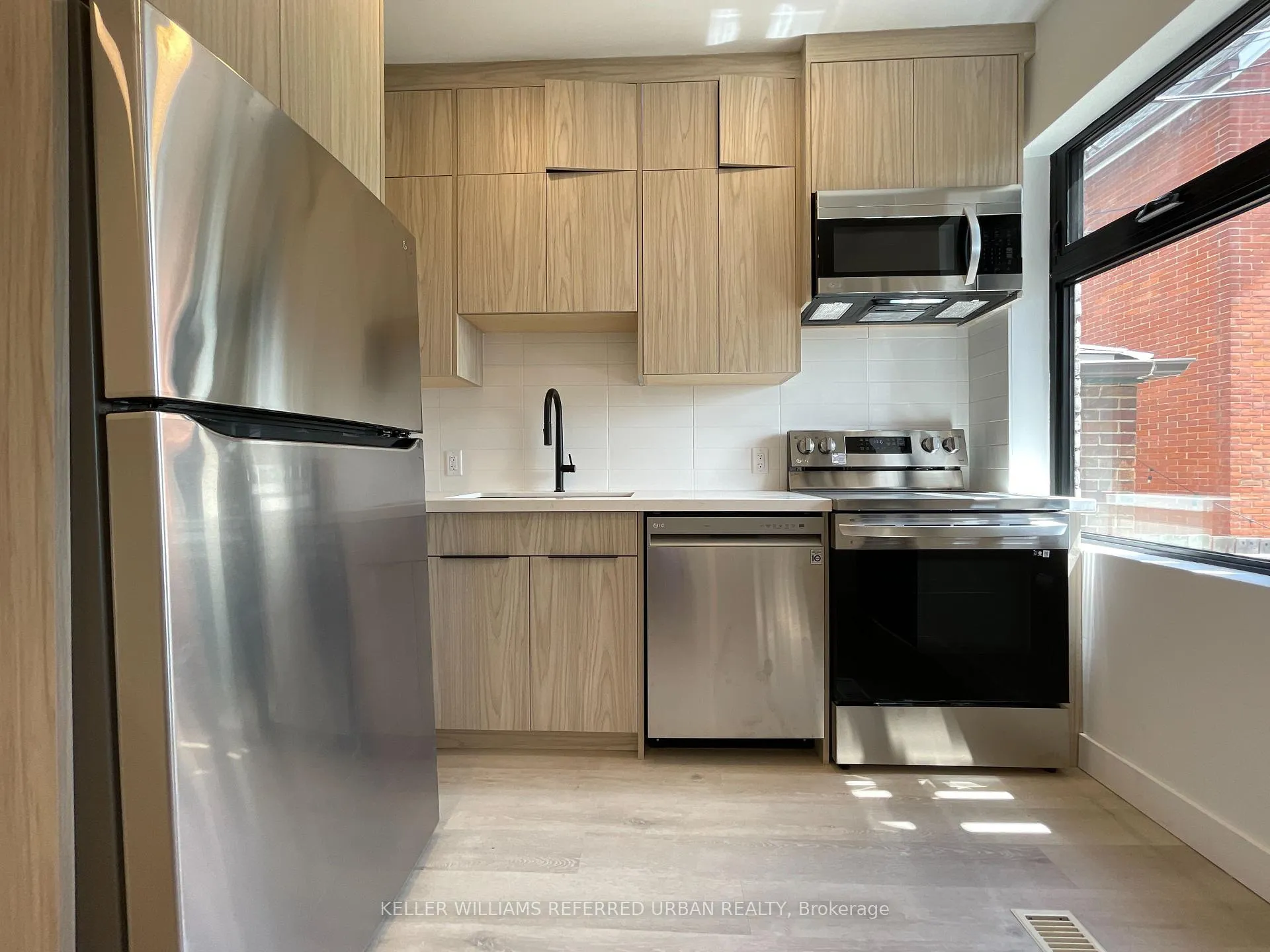 Photo 2 of Unit Main, 1821 Davenport Road, Toronto, Weston-Pellam Park — HOMEH