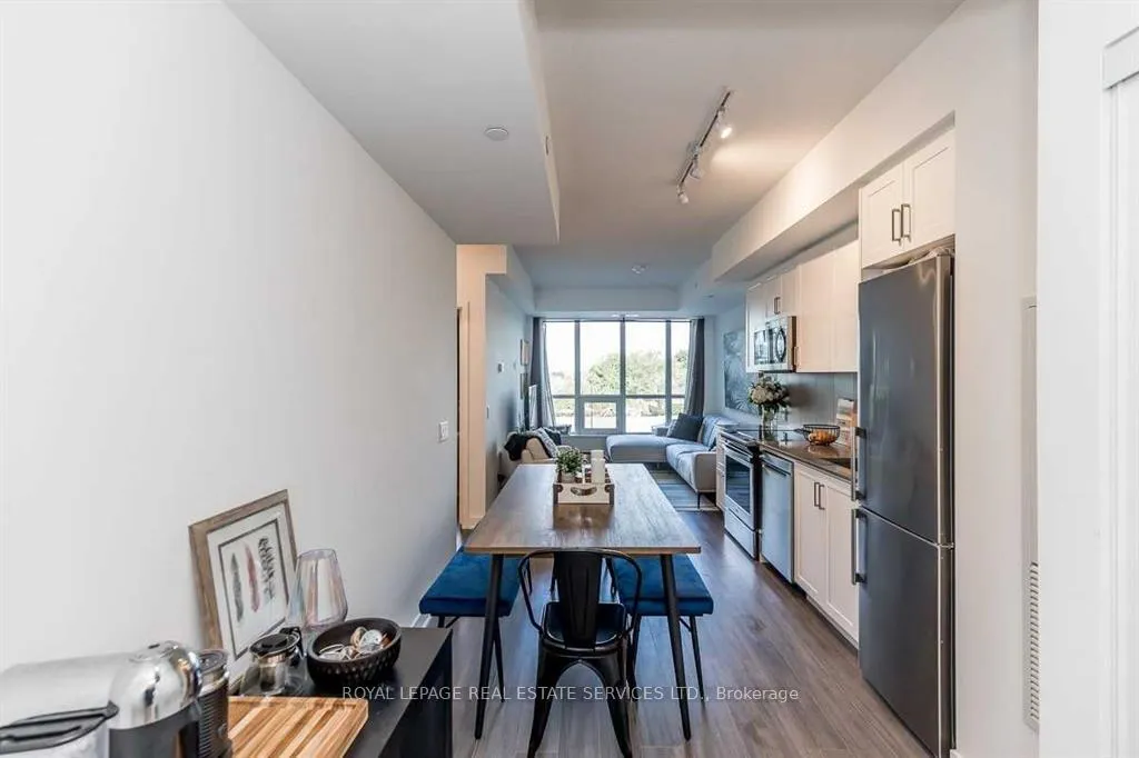 Photo 4 of Unit 203, 681 Yonge Street, Barrie, Painswick South — HOMEH