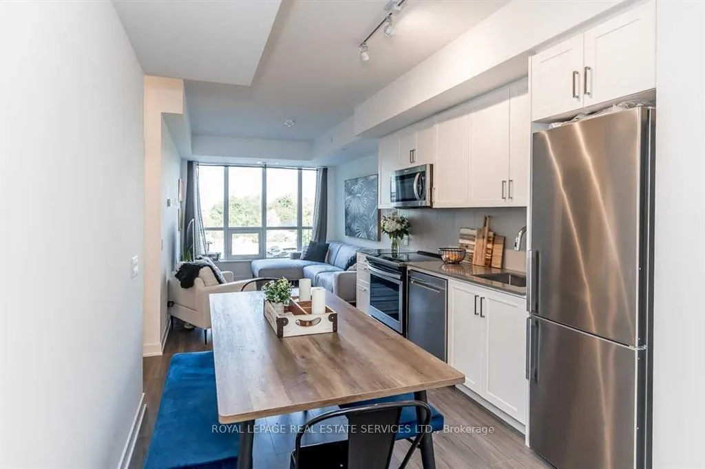 Photo 5 of Unit 203, 681 Yonge Street, Barrie, Painswick South — HOMEH