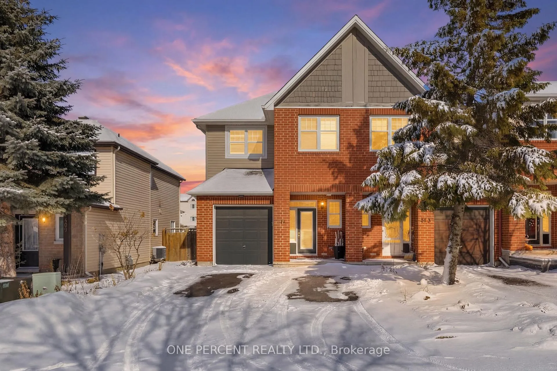 Front of 411 Cache Bay Crescent