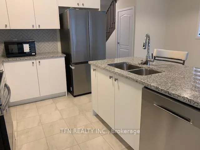 Photo 5 of 406 Eastbridge Avenue, Welland, Dain City — HOMEH