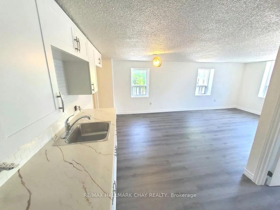 Photo 3 of Unit 5, 58 Queen Street W, Springwater, Elmvale — HOMEH