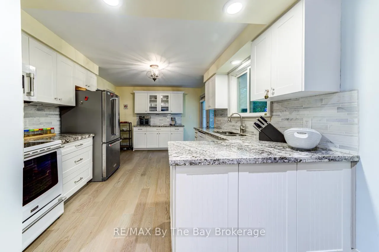 Photo 16 of 63 Rodrium Road, Wasaga Beach — HOMEH
