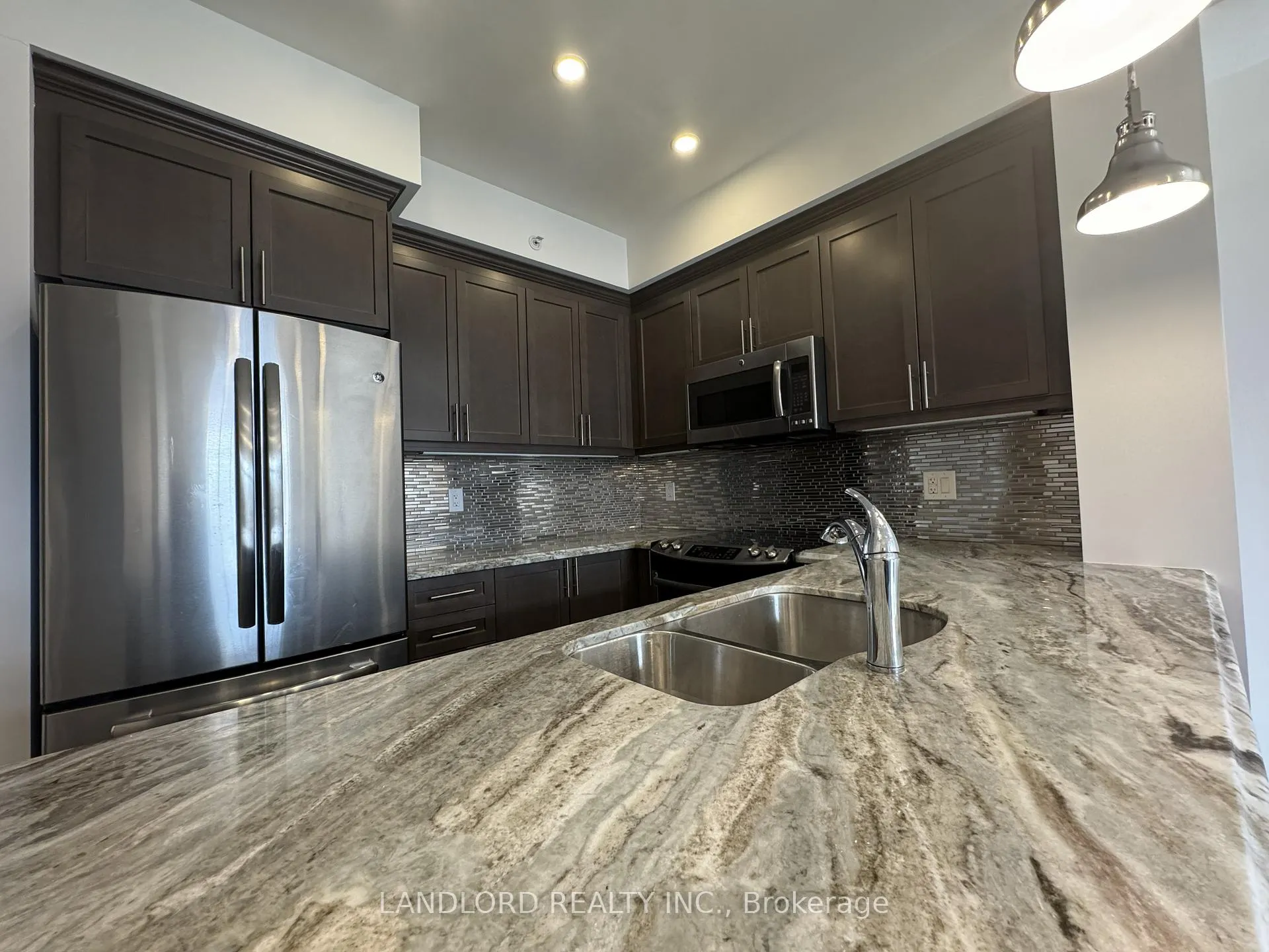Photo 5 of Unit 312, 2300 Upper Middle Road W, Oakville, Glen Abbey — HOMEH