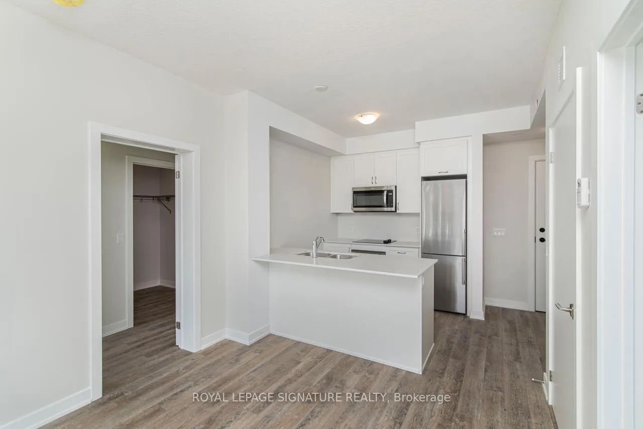 Photo 2 of Unit 104, 600 North Service Road, Hamilton, Lakeshore — HOMEH