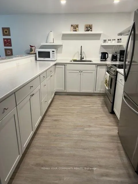 Photo 6 of Unit BSMT, 36 60th Street S, Wasaga Beach — HOMEH