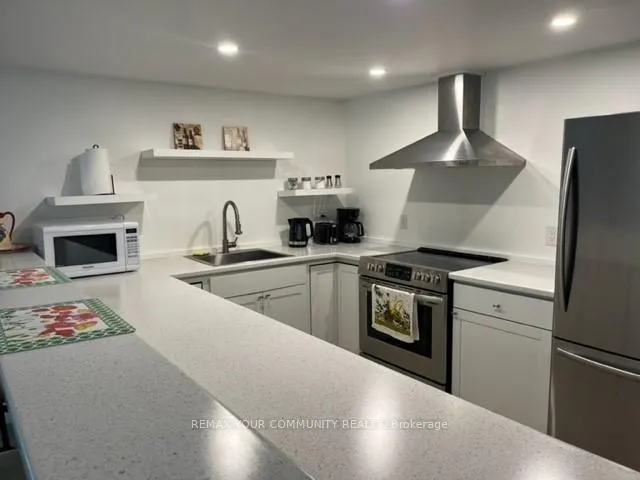 Photo 10 of Unit BSMT, 36 60th Street S, Wasaga Beach — HOMEH