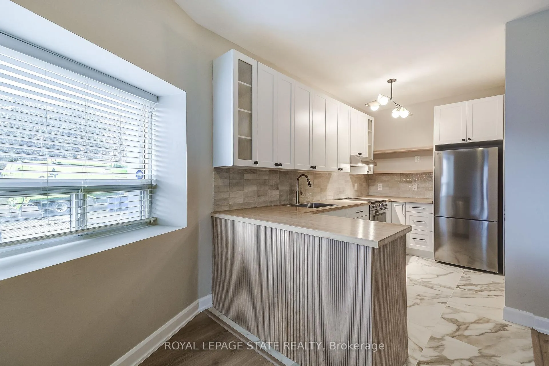 Photo 6 of Unit 107, 400 York Boulevard, Hamilton, Strathcona — HOMEH