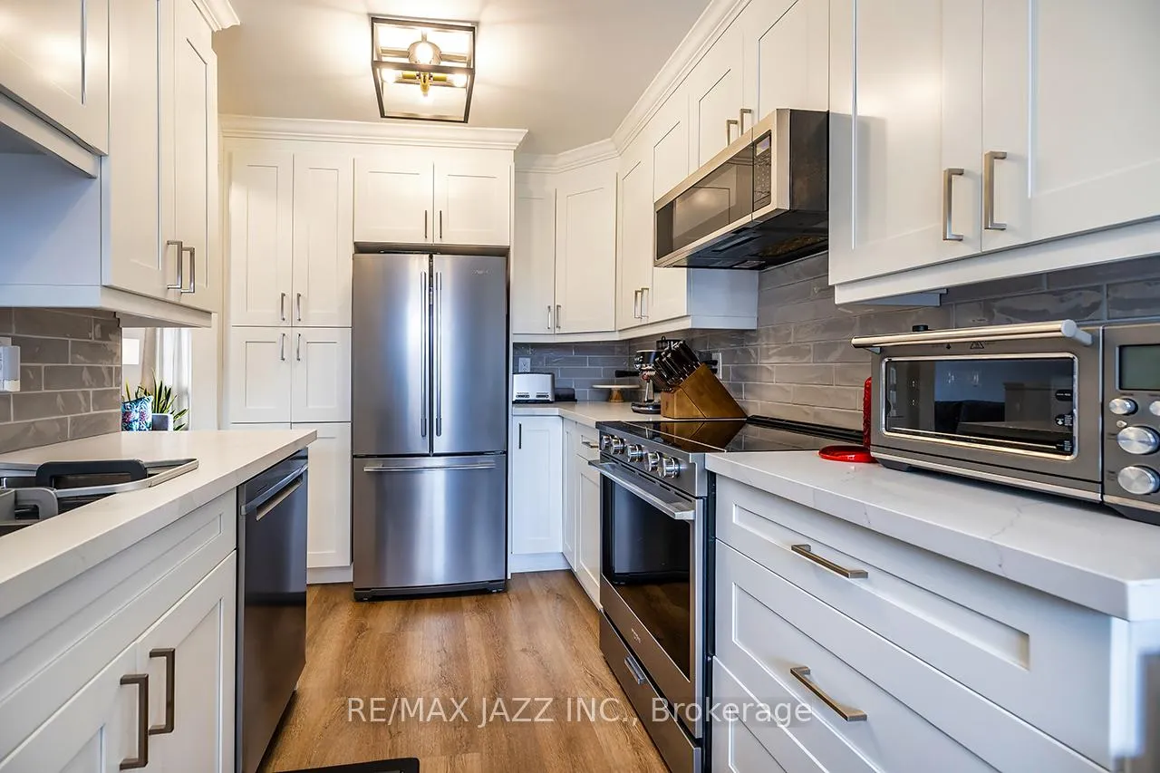 Photo 8 of Unit 77, 77 Park Lane Circle, Clarington, Bowmanville — HOMEH