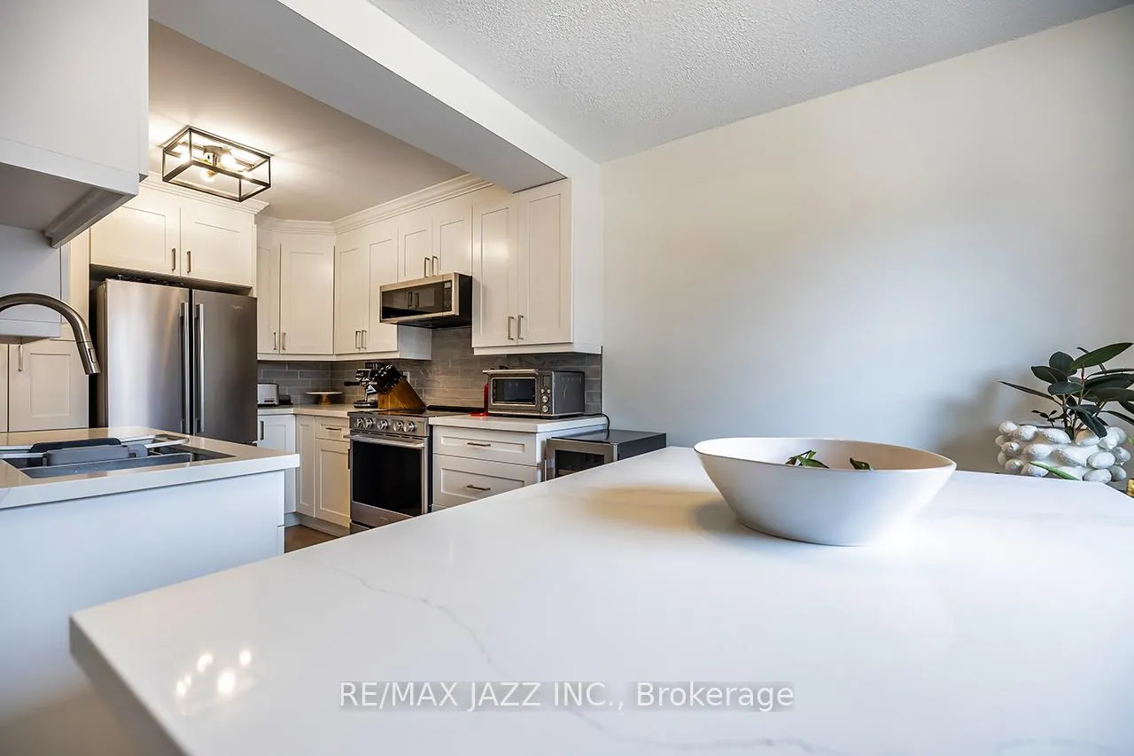 Photo 11 of Unit 77, 77 Park Lane Circle, Clarington, Bowmanville — HOMEH
