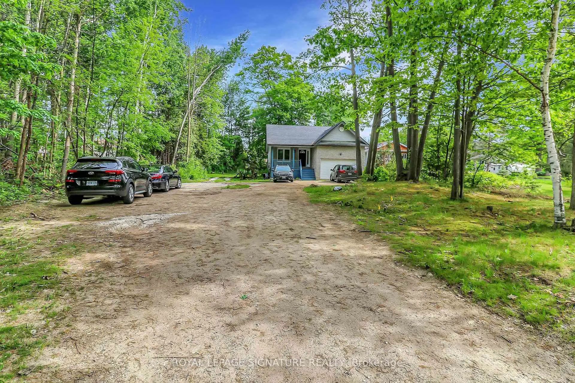 Photo 2 of Unit Main, 1463 River Road, Wasaga Beach — HOMEH