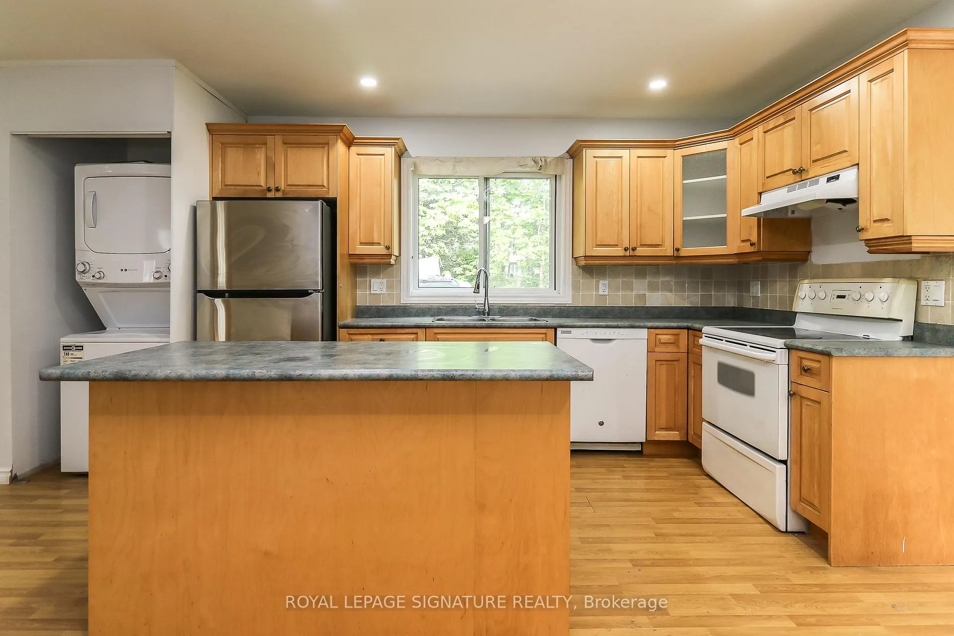 Photo 6 of Unit Main, 1463 River Road, Wasaga Beach — HOMEH