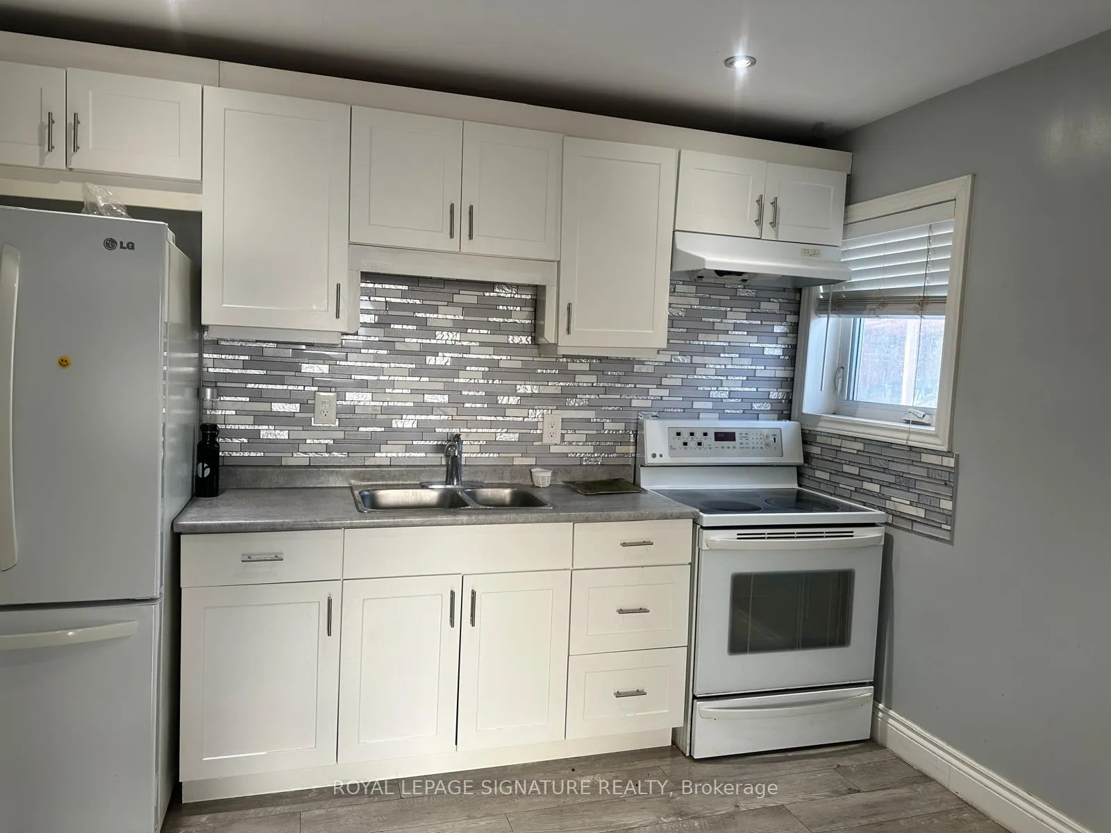 Photo 2 of 63 Wallis Crescent, Etobicoke, Mount Olive-Silverstone-Jamestown — HOMEH