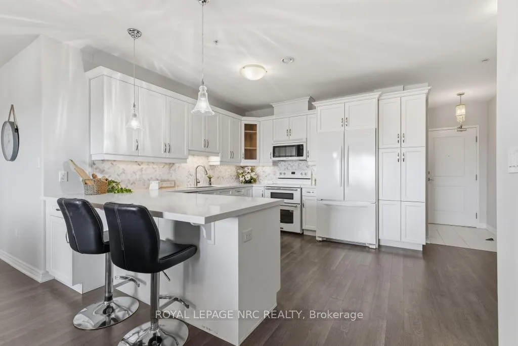Photo 5 of Unit 401, 379 Scott Street, St. Catharines, Vine/Linwell — HOMEH