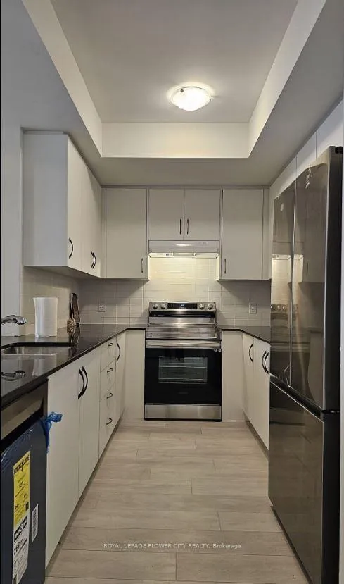 Photo 4 of Unit 52, 70 Knotsberry Circle, Brampton, Bram West — HOMEH