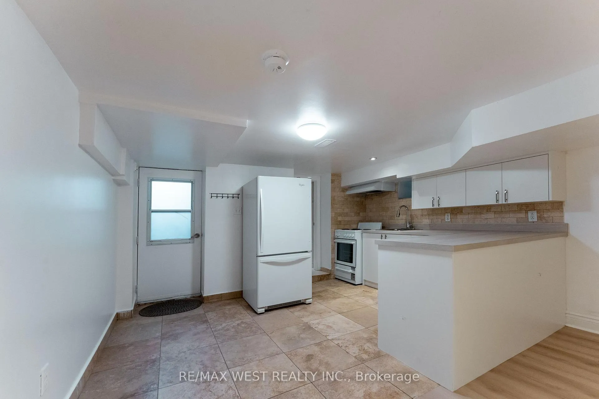 Photo 5 of Unit # Bsmt Ap, 12 Gillespie Avenue, Toronto, Weston-Pellam Park — HOMEH