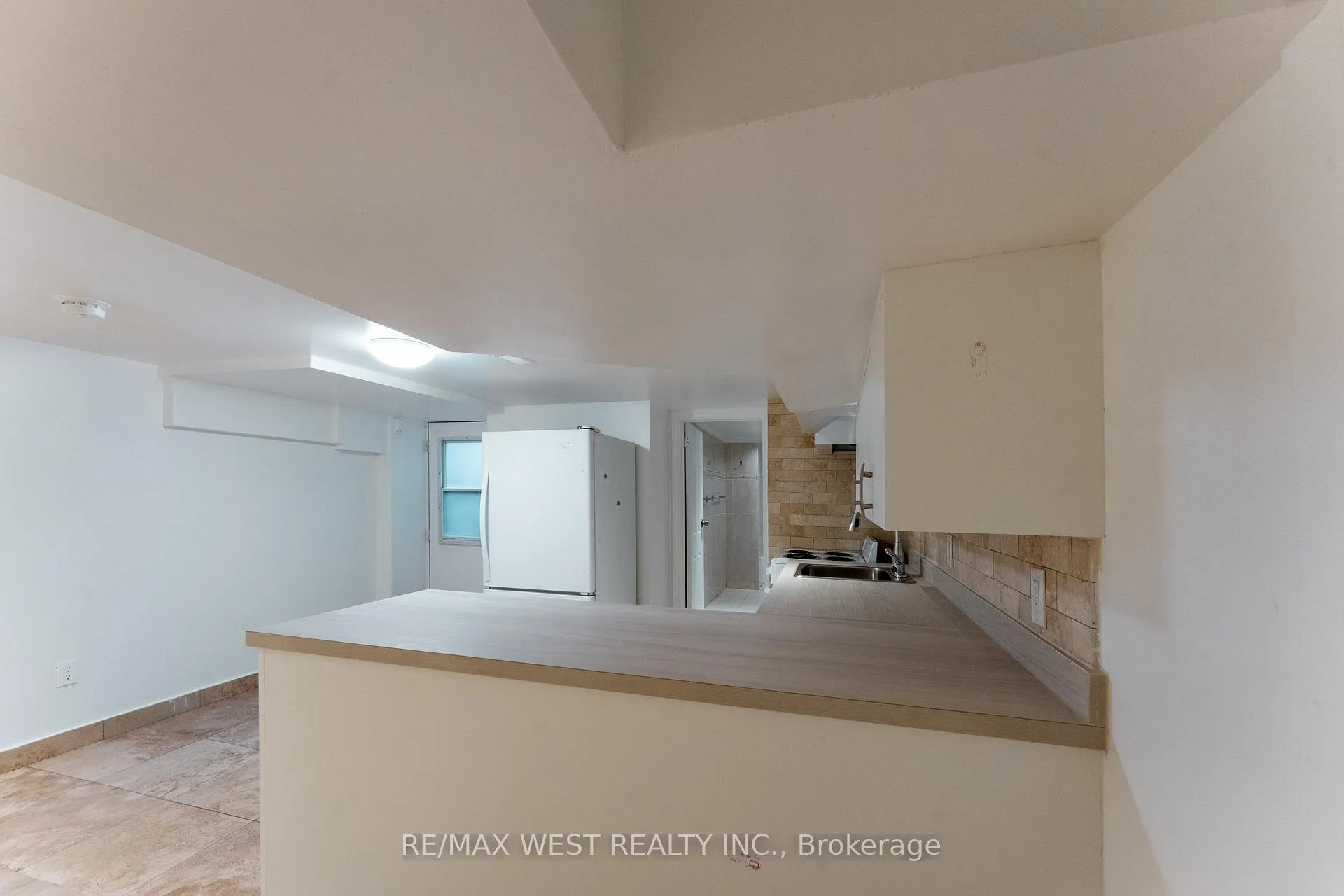 Photo 7 of Unit # Bsmt Ap, 12 Gillespie Avenue, Toronto, Weston-Pellam Park — HOMEH