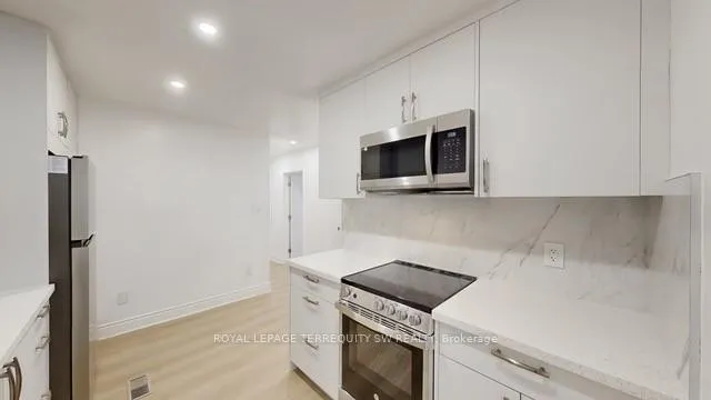 Photo 17 of Unit Main, 19 Hawthorne Road, Etobicoke, Kingsview Village-The Westway — HOMEH