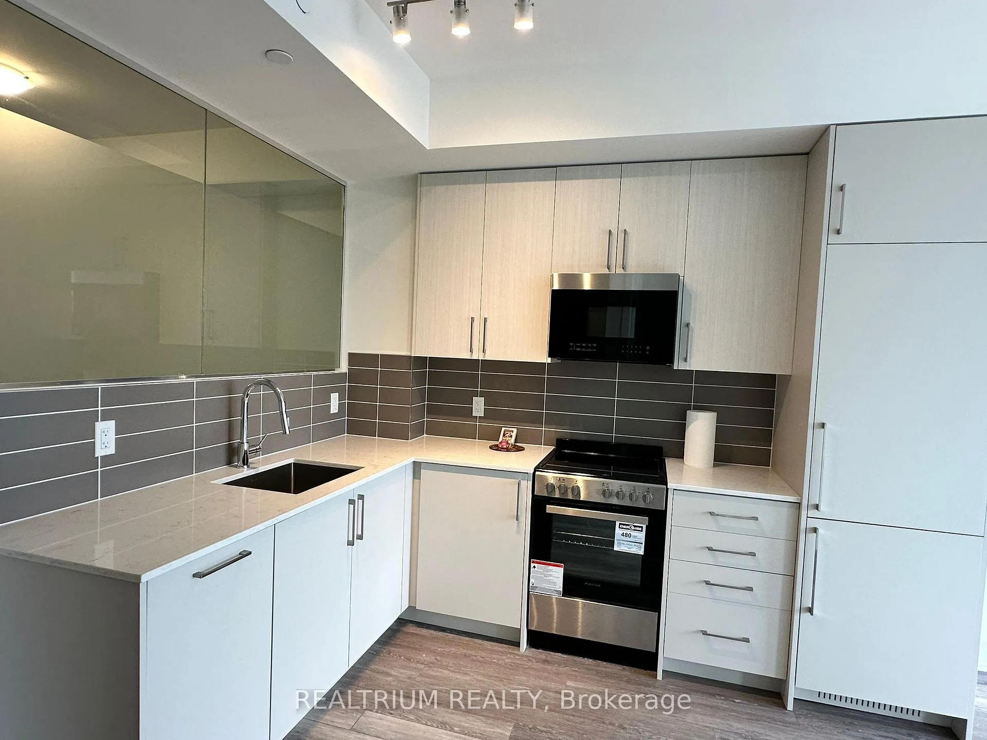 Photo 4 of Unit 334, 2075 King Road, King, King City — HOMEH