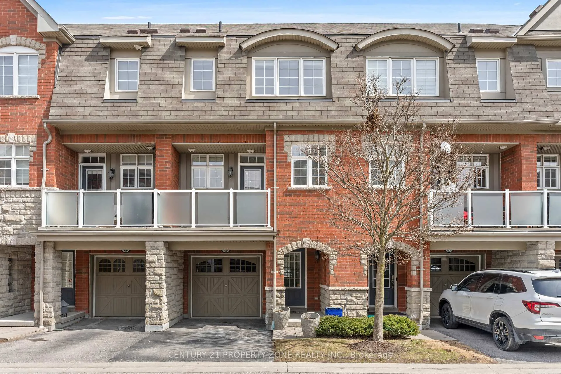 Photo 1 of Unit 13, 1701 Finch Avenue, Pickering, Village East — HOMEH