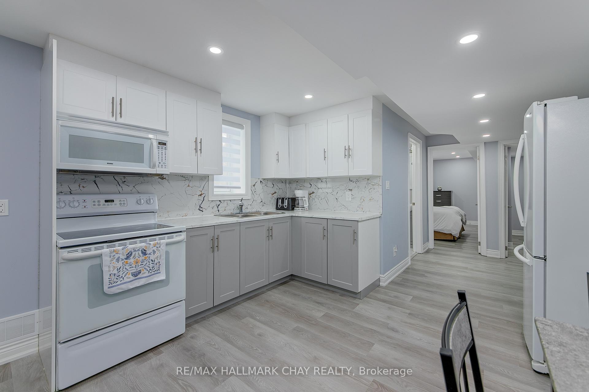 Photo 10 of Unit B1, 896 John Street, Innisfil, Churchill — HOMEH