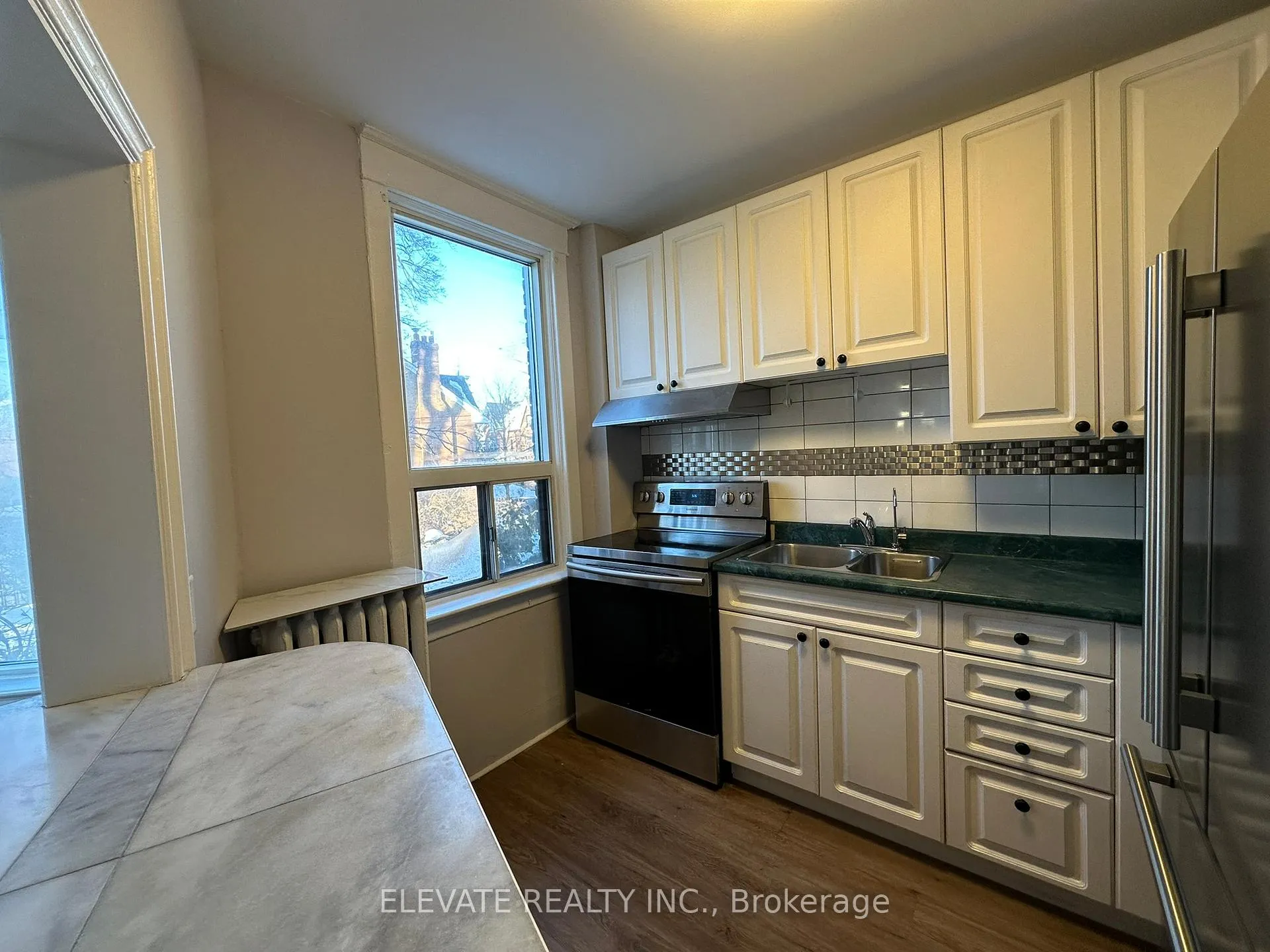 Photo 2 of Unit 2, 63A Garden Avenue, Toronto, Roncesvalles — HOMEH