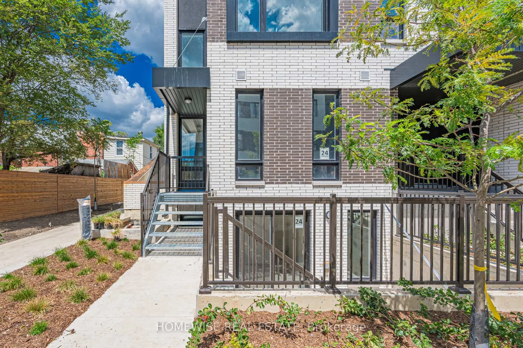 Photo 3 of Unit TH8, 20 Ed Clark Gardens, Toronto, Weston-Pellam Park — HOMEH