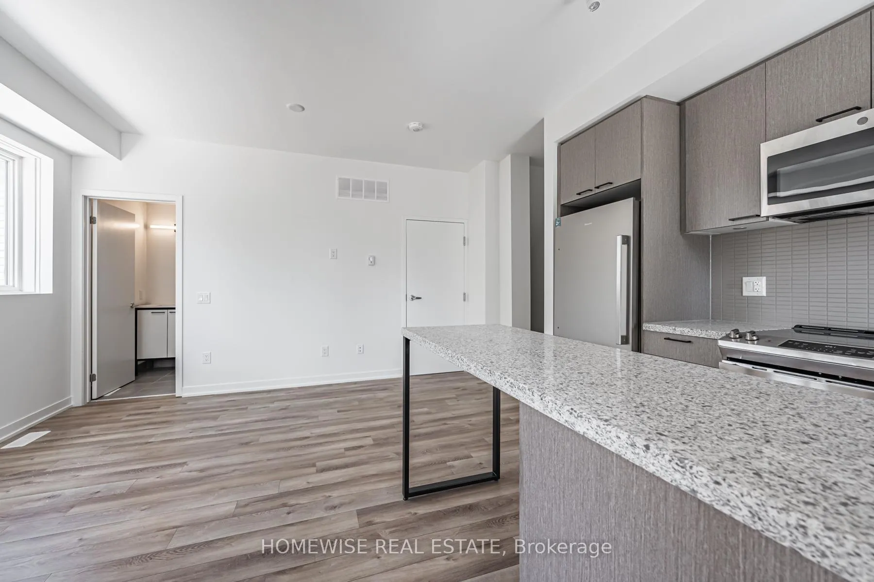 Photo 6 of Unit TH8, 20 Ed Clark Gardens, Toronto, Weston-Pellam Park — HOMEH