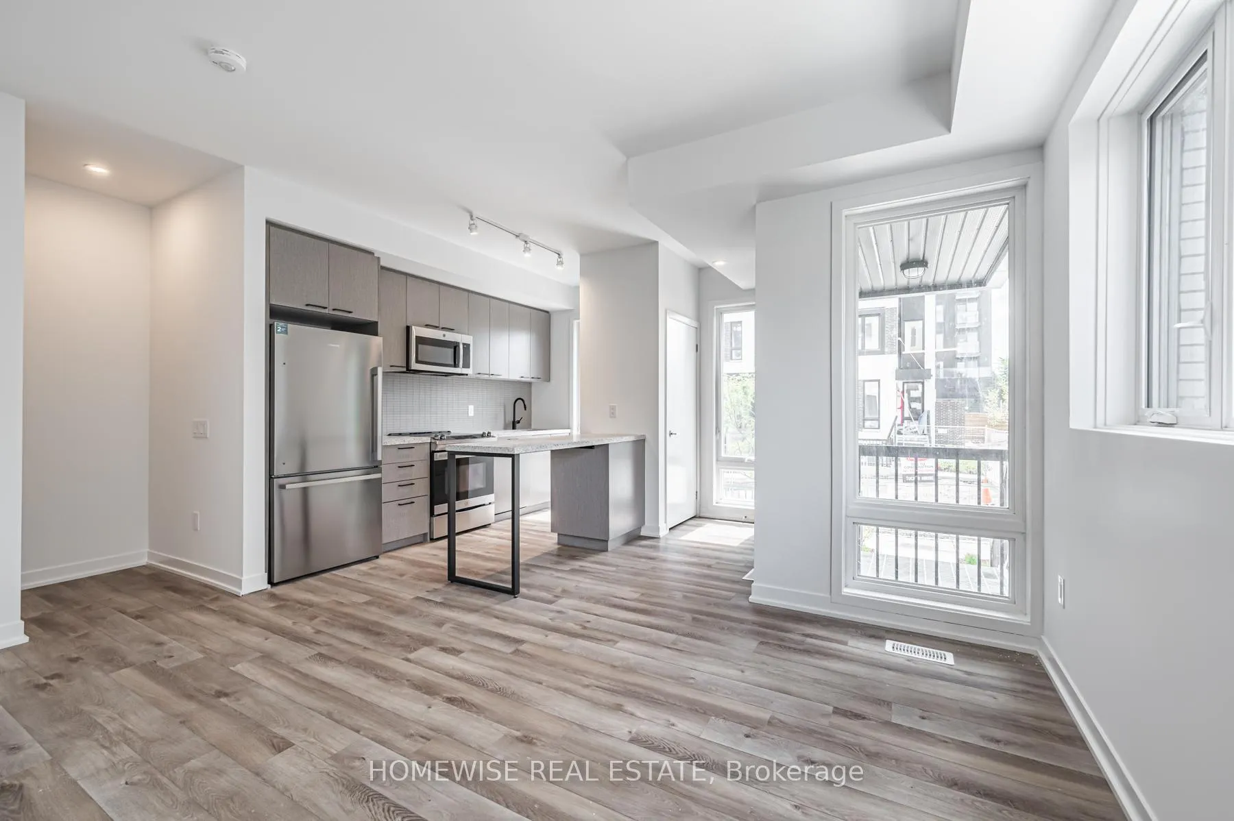 Photo 7 of Unit TH8, 20 Ed Clark Gardens, Toronto, Weston-Pellam Park — HOMEH