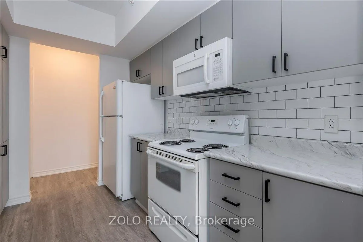 Photo 10 of Unit 402, 100 Dean Avenue, Barrie, Painswick South — HOMEH