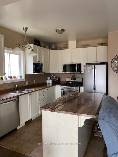 Photo 2 of 129 Macdougall Drive, Loyalist, Amherstview — HOMEH