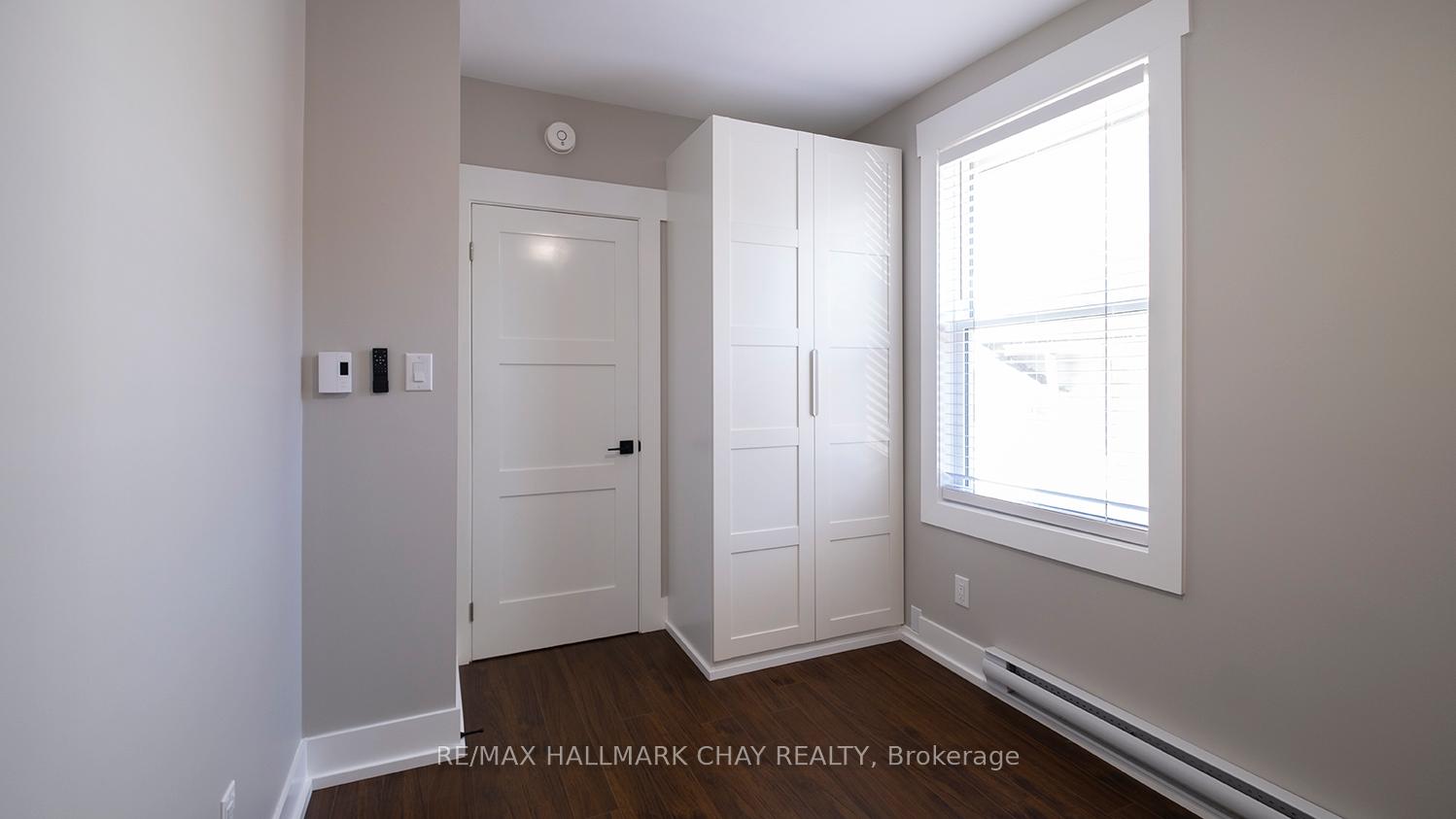 Photo 5 of Unit APT#2, 14 Queen Street, Innisfil, Cookstown — HOMEH