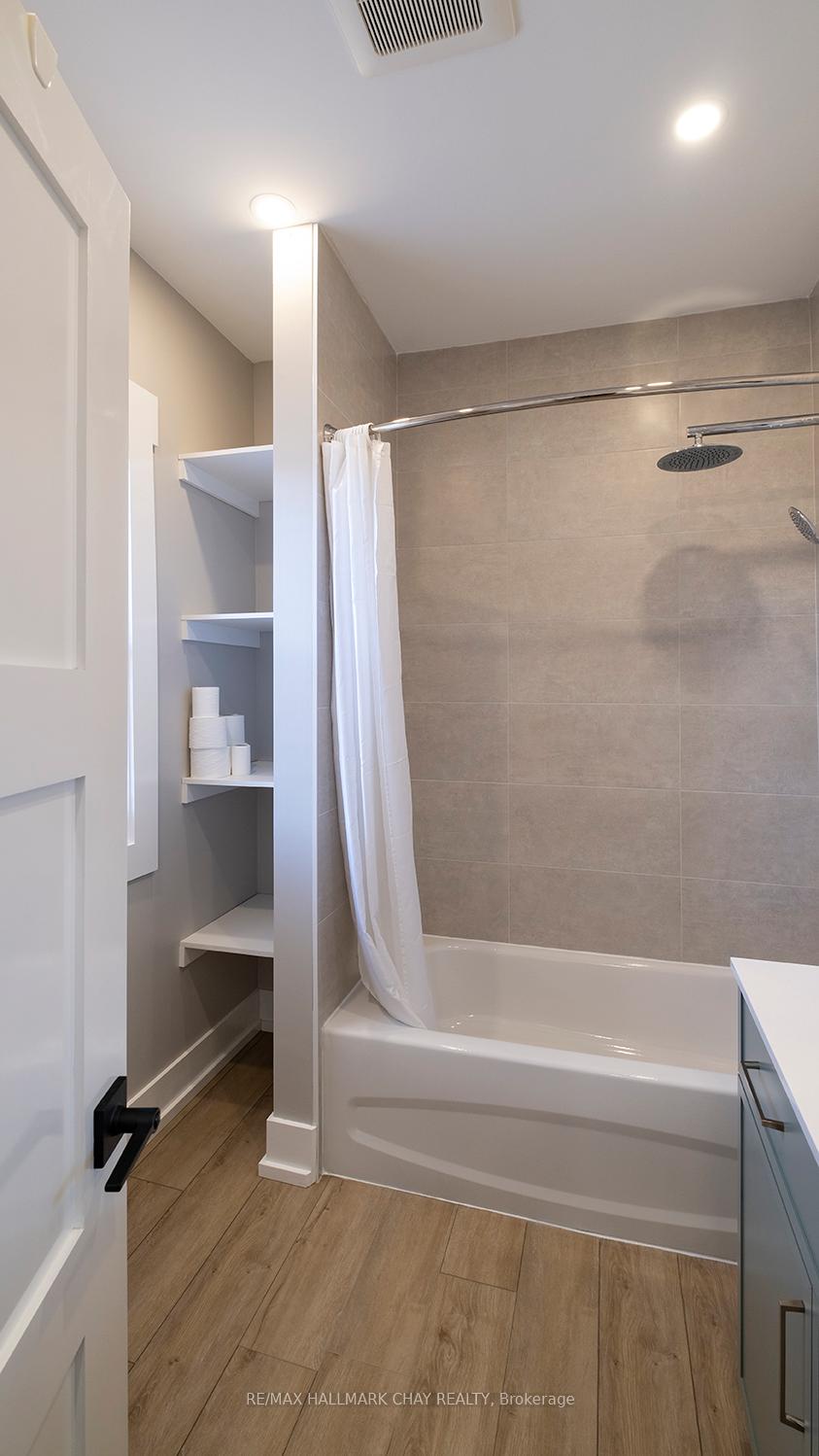 Photo 11 of Unit APT#2, 14 Queen Street, Innisfil, Cookstown — HOMEH