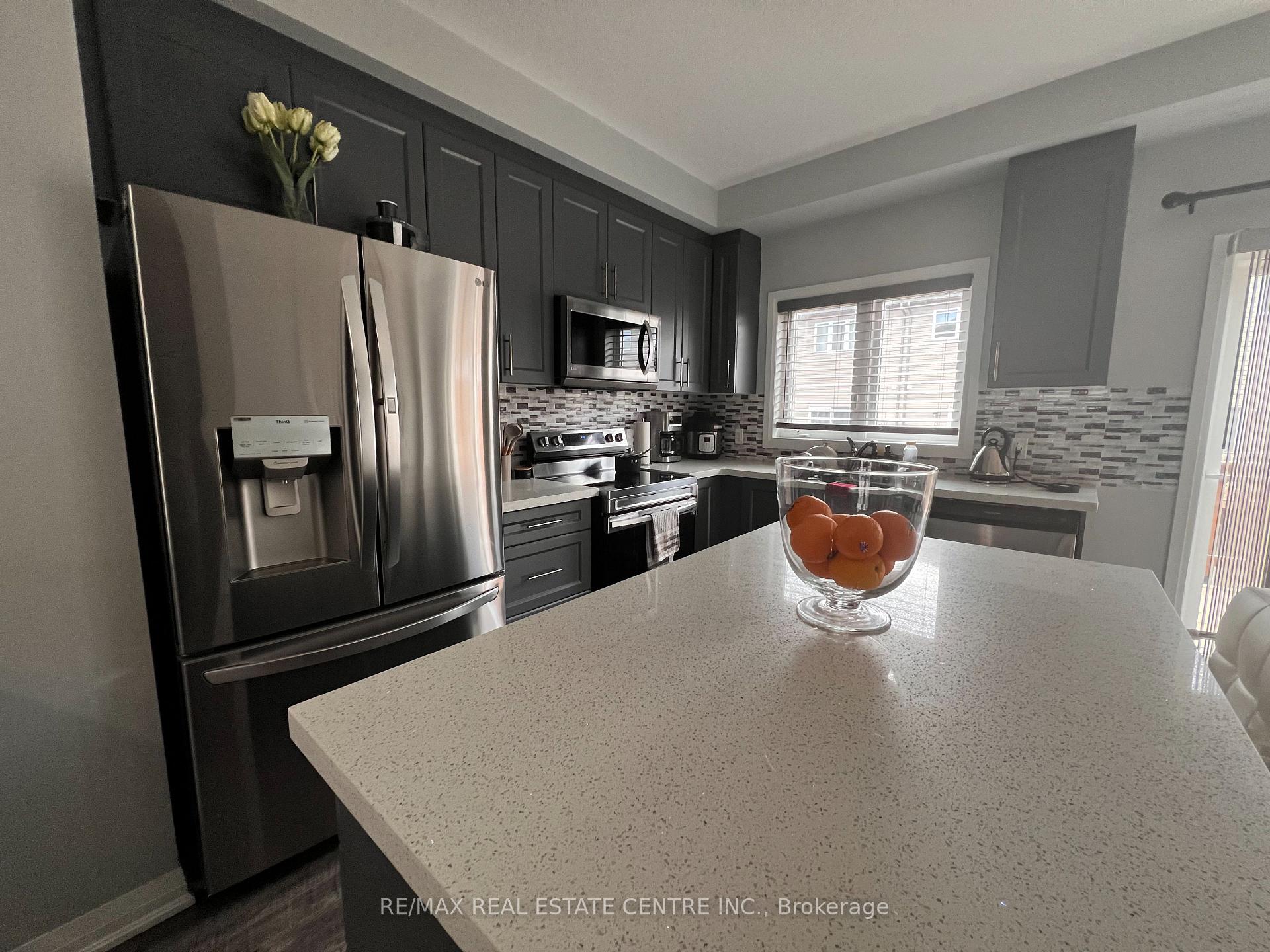 Photo 5 of 60 Aquarius Crescent, Hamilton, Rural Glanbrook — HOMEH